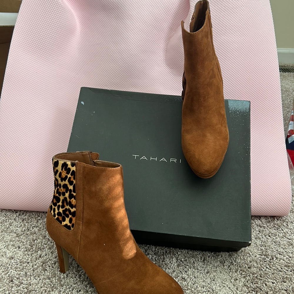 This Cognac/ suede, leopard print platform boot by Tahari gently used.
